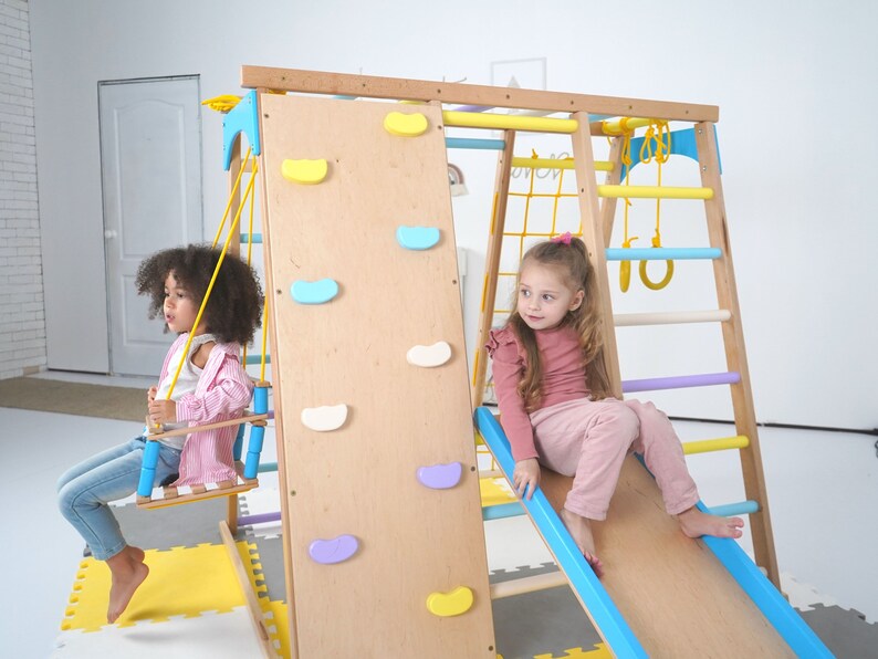 Montessori Climbing Wall: Wooden Indoor Play Gym with Slide, Rings, Swing, Monkey Bars and Net Ladder for Kids