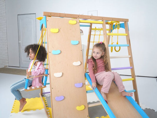 Montessori Climbing Wall: Wooden Indoor Play Gym with Slide, Rings, Swing, Monkey Bars and Net Ladder for Kids